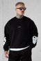 BLACK BLURRED HEARTS OVERSIZED SWEATER