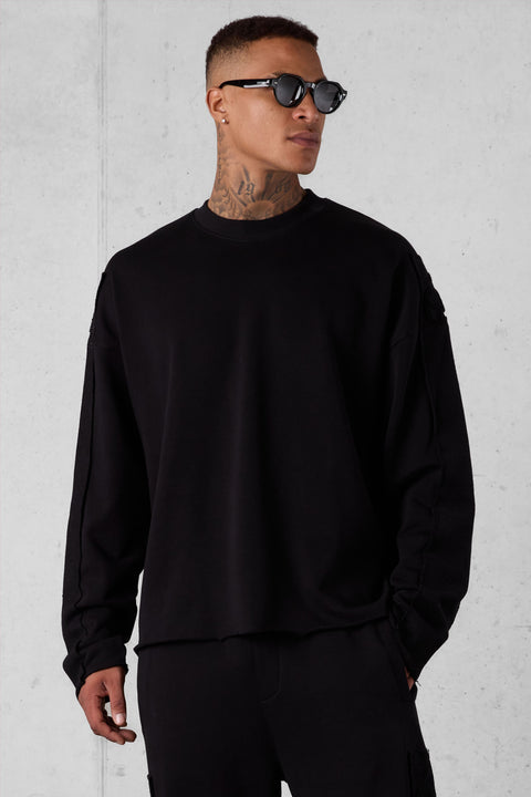 BLACK APPLIQUÉ DISTRESSED OVERSIZED SWEATER