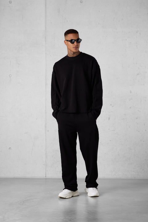 BLACK APPLIQUÉ DISTRESSED OVERSIZED SWEATER